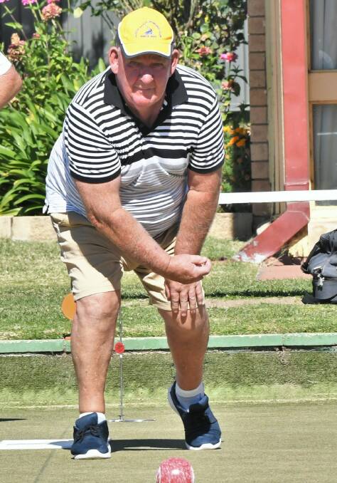 IN ACTION: Butch Stevens enjoys a social game of lawn bowls Easter Saturday afternoon at the Majellan Club. Photo: CHRIS SEABROOK 040321cmbowls2