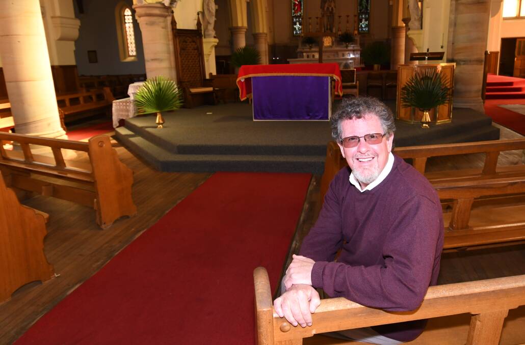 GOOD NEWS: Dean of Cathedral Father Paul Devitt, at the St Michael and St John Cathedral ahead of Easter celebrations this weekend. Photo: CHRIS SEABROOK 032718ceaster