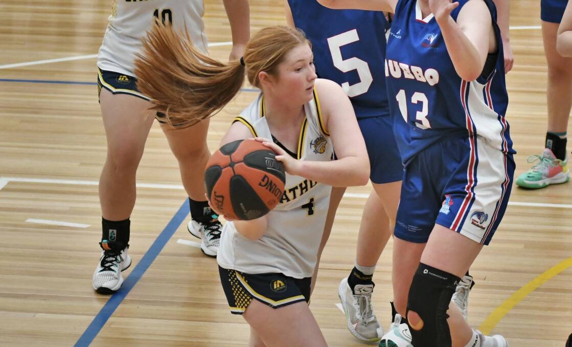 TOURNAMENT TIME: Hannah Dunn and the Bathurst Goldminers under 18s girls will be playing at home this weekend. Photo: CHRIS SEABROOK
