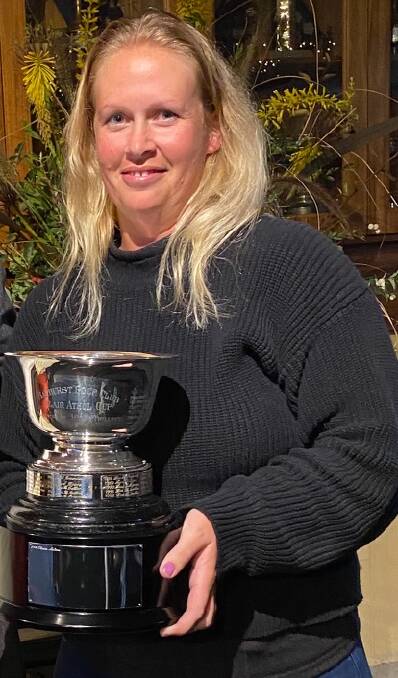 WINNER: Muswellbrook native Danae Royal with the Blair Athol Cup after winning the Bathurst Women's Open on Tuesday. Photo: CONTRIBUTED