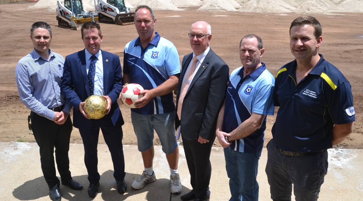 Andrew Rankin (pictured second on left) with NSW Football's Daniel Ristic, Bathurst MP Paul Toole, then BDF president Andrew Speed, then Bathurst mayor Graeme Hanger and Dustin Bartholomew, when Proctor Park was undergoing significant renovations. Picture by Bradley Jurd