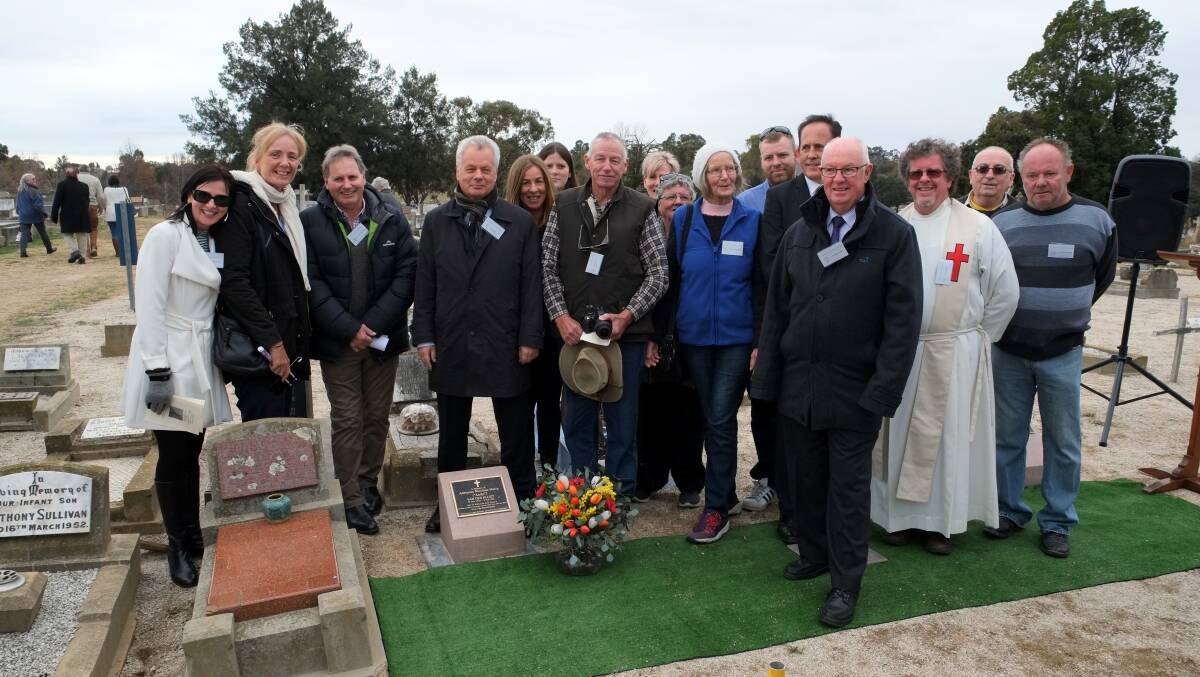 UNVEILED: Bathurst councillors, Bathurst Family History Group members, family members and members of the community witness the unveiling of the tombstone of Dutch migrant Adrianus “Aadje” Nicholaas Maria Van Der Klugt. 