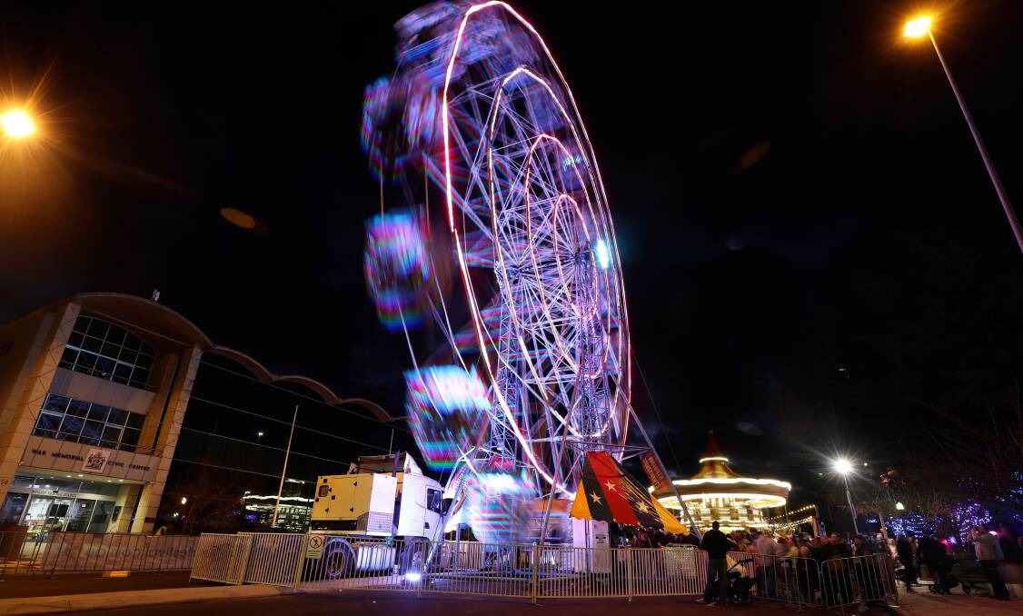 SNAPSHOT: The ferris wheel was a popular site at the Bathurst Winter Festival on Saturday night. Photo: PHIL BLATCH