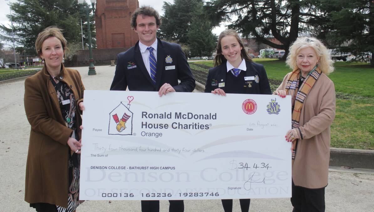DONATE: Ronald McDonald House's Rebecca Walsh, Bathurst High's Charlie Hutchings and Zoe Peters and media volunteer Janice Harris. Photo: BRADLEY JURD