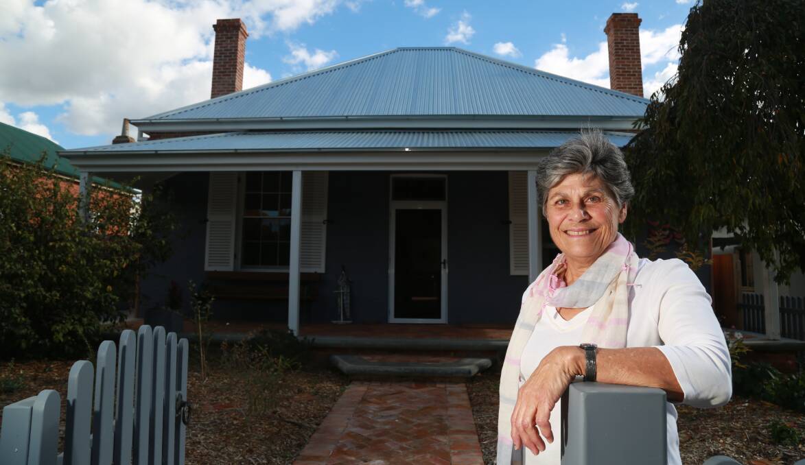 NEW LOOK: Libby Loneragan at her Chifley Heritage Award nominated house on Morrisset Street. Photo: PHIL BLATCH  