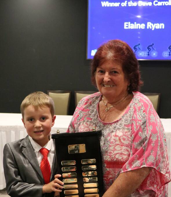 BIG HONOUR: Sebastian Gallagher with his grandmother Elaine Ryan, with the latter awarded the Bathurst Cycling Club's Dave Carroll Trophy. Photo: KERRYN WINDSOR