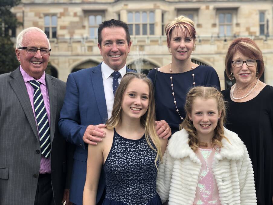 FAMILY: Member for Bathurst Paul Toole at Government House in Sydney with his family, including his father and mother Trevor and Ellen Toole, wife Jo and daughters Keely and Scout.