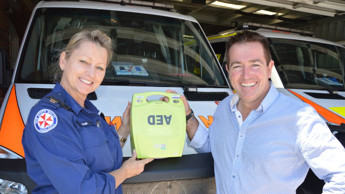 SAVING LIVES: Ambulance Service of NSW acting zone manager for Chifley, Kathy Golledge, and Member for Bathurst Paul Toole with a life-saving automatic external defibrillator.