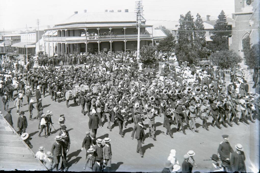 BAD TASTE: Bandsmen at the intersection of Howick and George streets with the Club House Hotel in the background. For a brief period, the hotel sold coffee, not liquor.