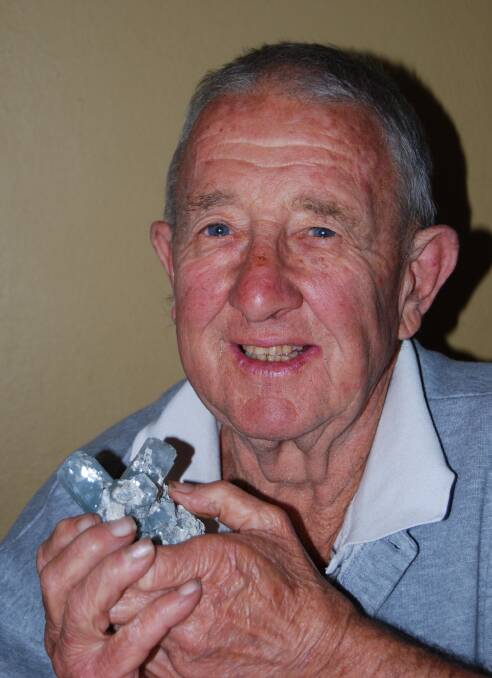 GEM OF AN EVENT: Ernst Holland, pictured with an aquamarine specimen, will judge at Gemboree 2017, incorporating the 53rd National Gem and Mineral Show.