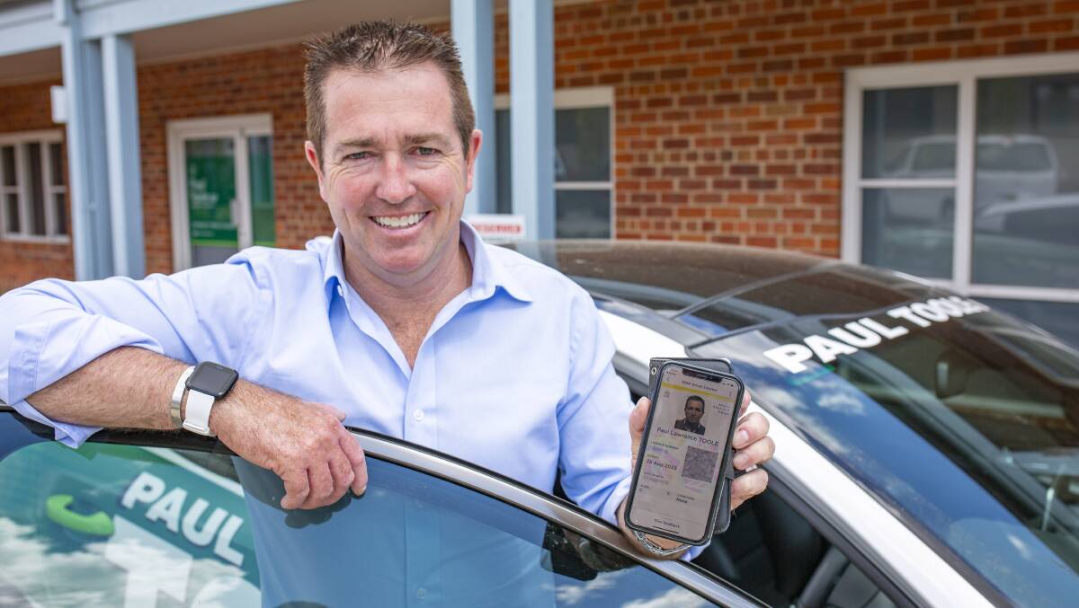 SMART: Member for Bathurst Paul Toole with his recently downloaded Digital Driver's Licence.