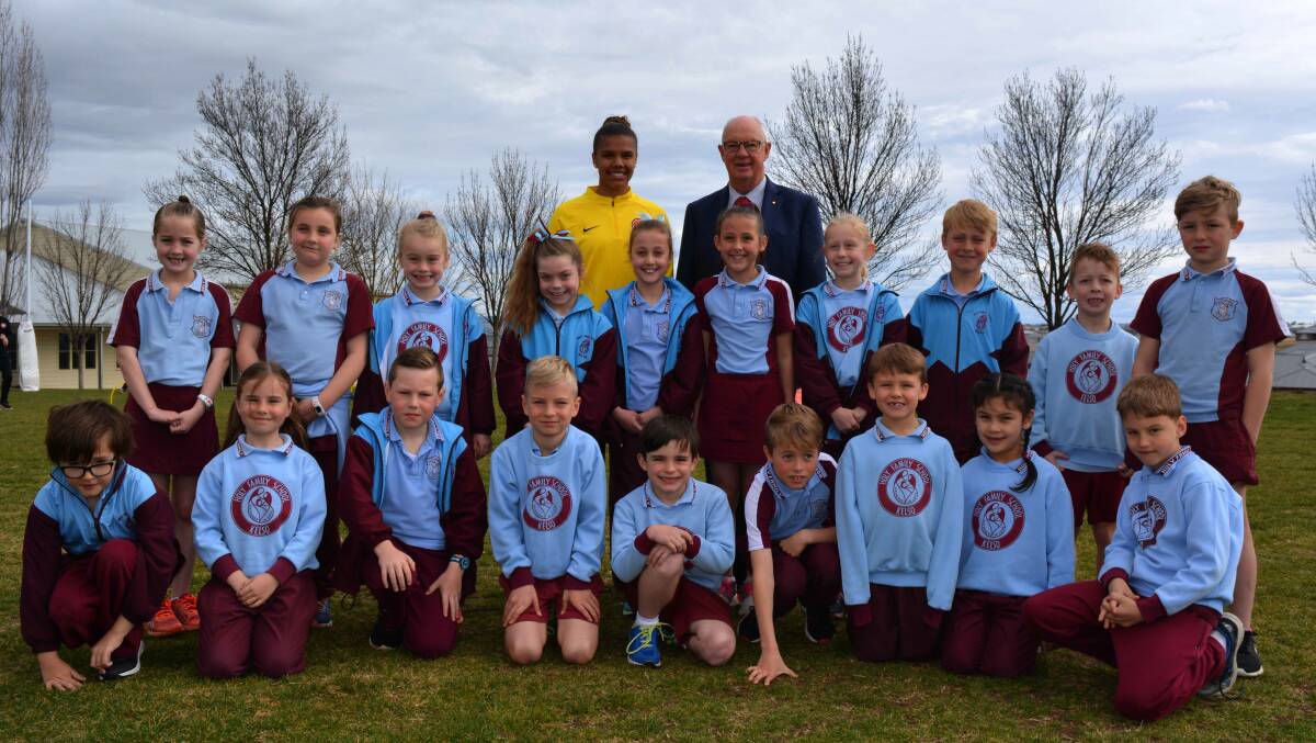 SUPER SKILLS: W-League star Jada Whyman, mayor Graeme Hanger and students from Holy Family School.