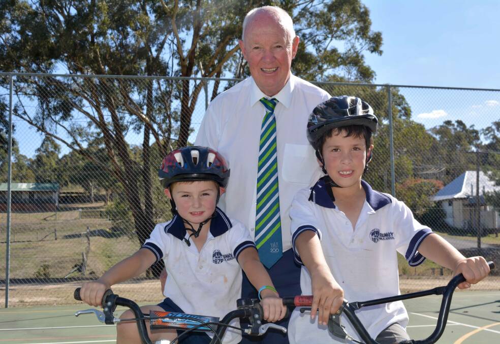 PEDAL POWER: Mayor Graeme Hanger with Charlie and Cooper from Trunkey Public School. The Bathurst Cycling Classic is fast approaching.