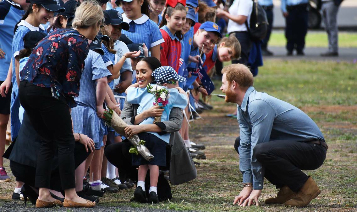 BIG HITS: Luke Vincent, a student at Buninyong Primary School, was among those invited from public schools to welcome the Duke and Duchess of Sussex at the Dubbo airport.