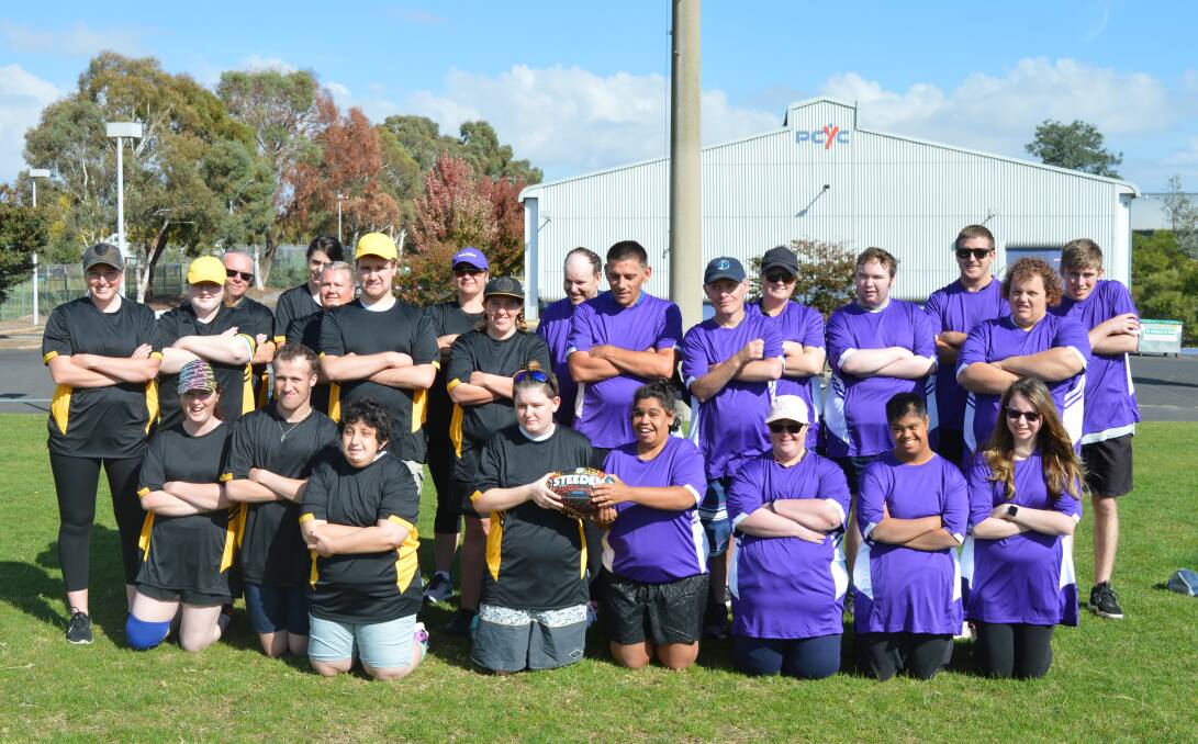 READY TO PLAY: The purple and black teams of LiveBetter players will play a game of league tag in front of up to 10,000 people on Saturday night. Photo: SUPPLIED