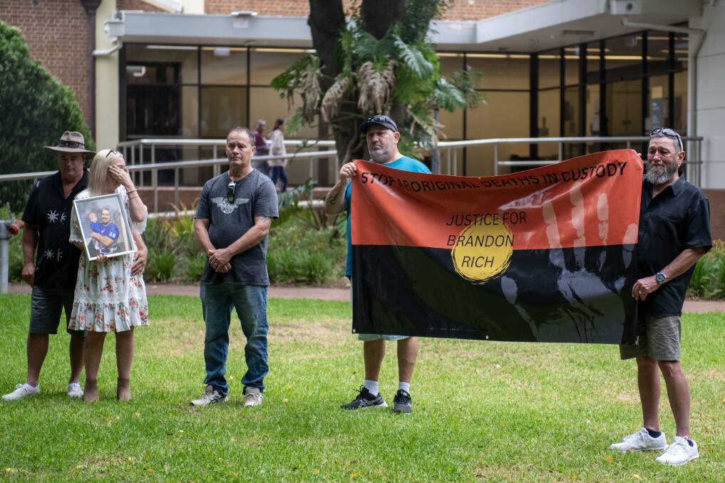 Brandon Rich's family stand together outside Dubbo Court House. Picture by Belinda Soole 