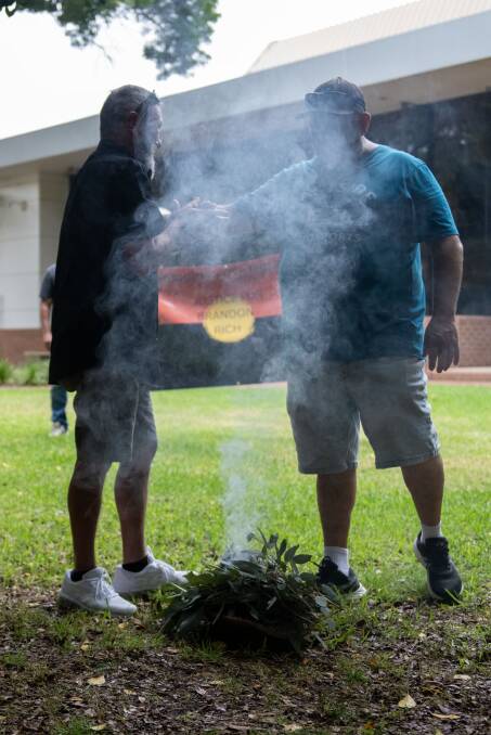 Brandon Rich's uncles go through a smoking ceremony. Picture by Belinda Soole 