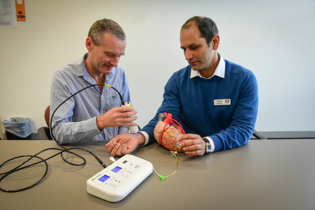 RESEARCH: Dr Michael Fox and Dr Rohit Barthwal will study the use of laser therapy on patients to reduce damage to the heart when inserting stents. Picture: Paul Scambler