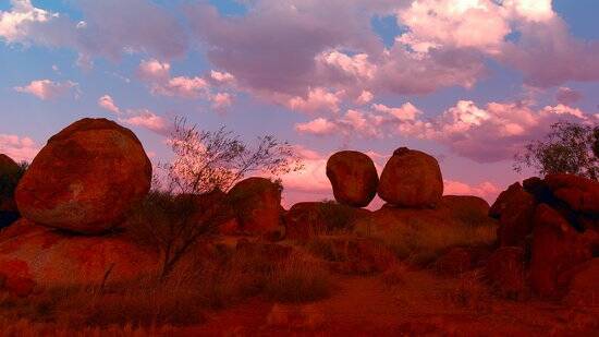 It's magical to watch the tansitioning light drench the ancient boulders in different shades. 