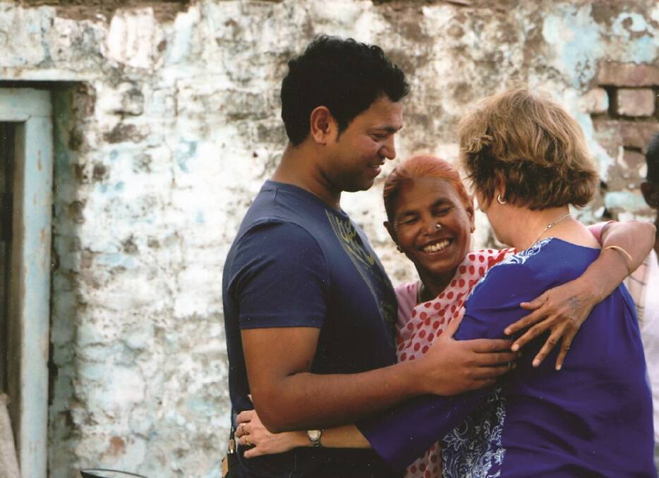 Saroo took Sue to meet his biological mother Fatima in India in 2013.
