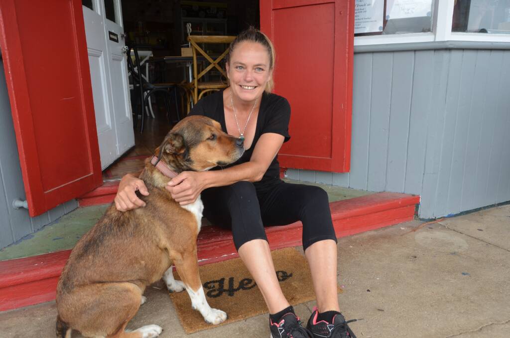 GOODBYE: Universal Eatery chef Melissa Clear, pictured with her dog Ruby, who she says is a town mascot, is moving the cafe to Oberon. Picture: PHOEBE MOLONEY