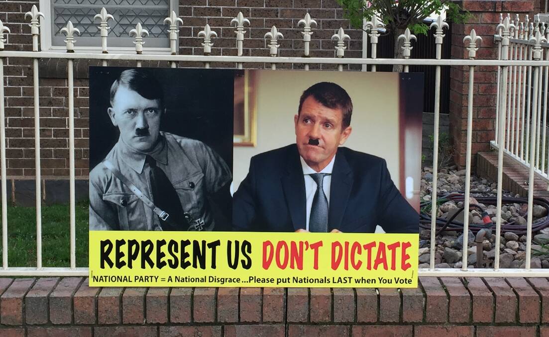 BLUNT MESSAGE: One of the controversial election posters outside an Orange home this week.