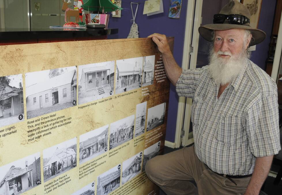 BUSY: Hill End historian Malcolm Drinkwater, pictured with one of the displays he created using the Holtermann photographs, is releasing new editions of his books. 