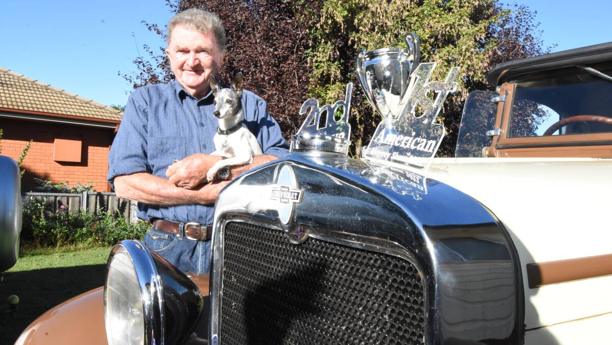 MAN AND MACHINE: Albert McKenzie's 1929 Chevrolet Coupe, which he bought from Bathurst, is often seen driving the streets of Blayney.