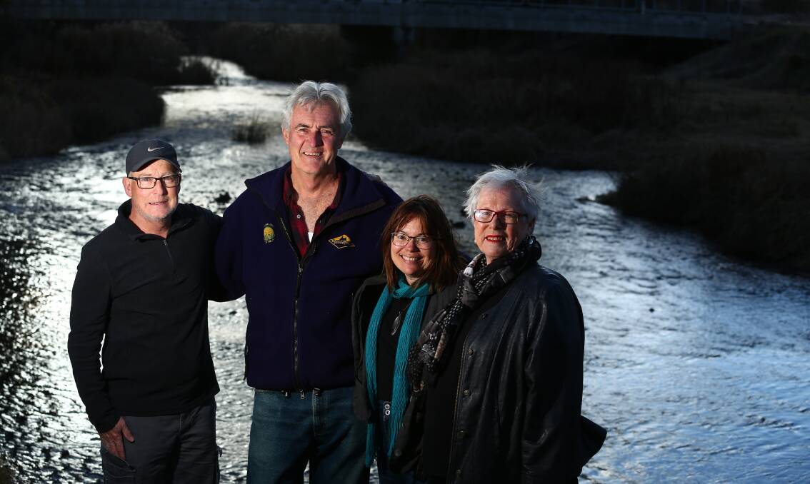 FLASHBACK: David Abernethy, John Fry, Tracy Sorensen and councillor Monica Morse celebrating beside the Macquarie River in 2017 after Regis shelved its plans to buy Bathurst's treated effluent. Photo: PHIL BLATCH