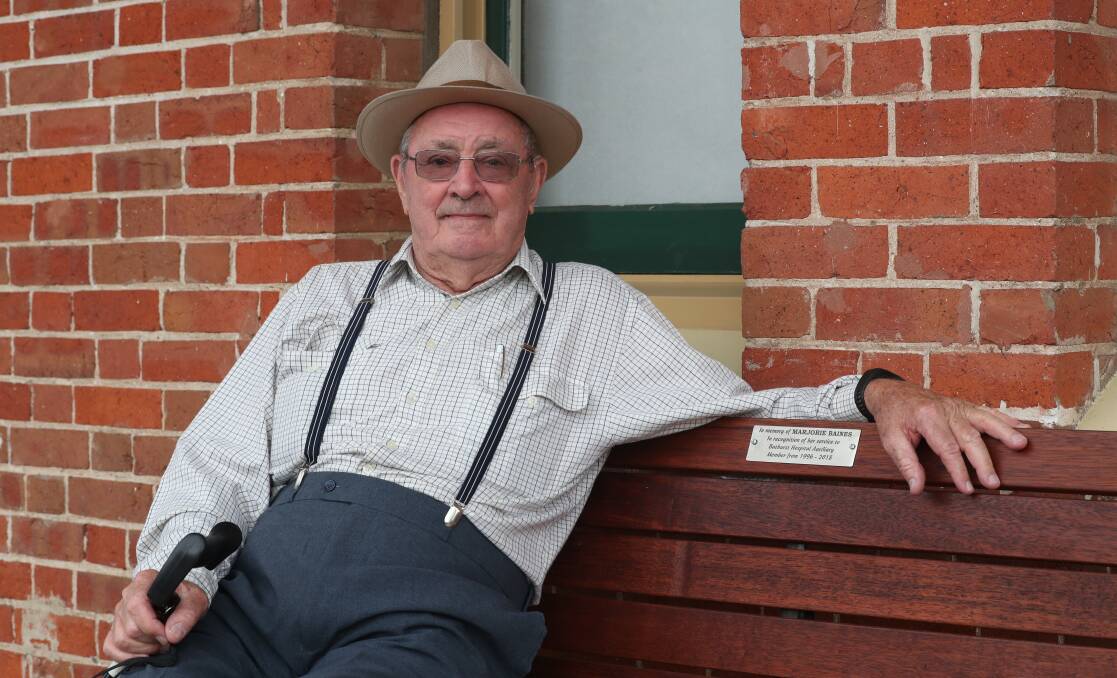 REMEMBERED: Brian Baines on the bench dedicated to his late wife Marj, a long-time member of the Bathurst Base Hospital Auxiliary. Photo: PHIL BLATCH 030919pbfete7