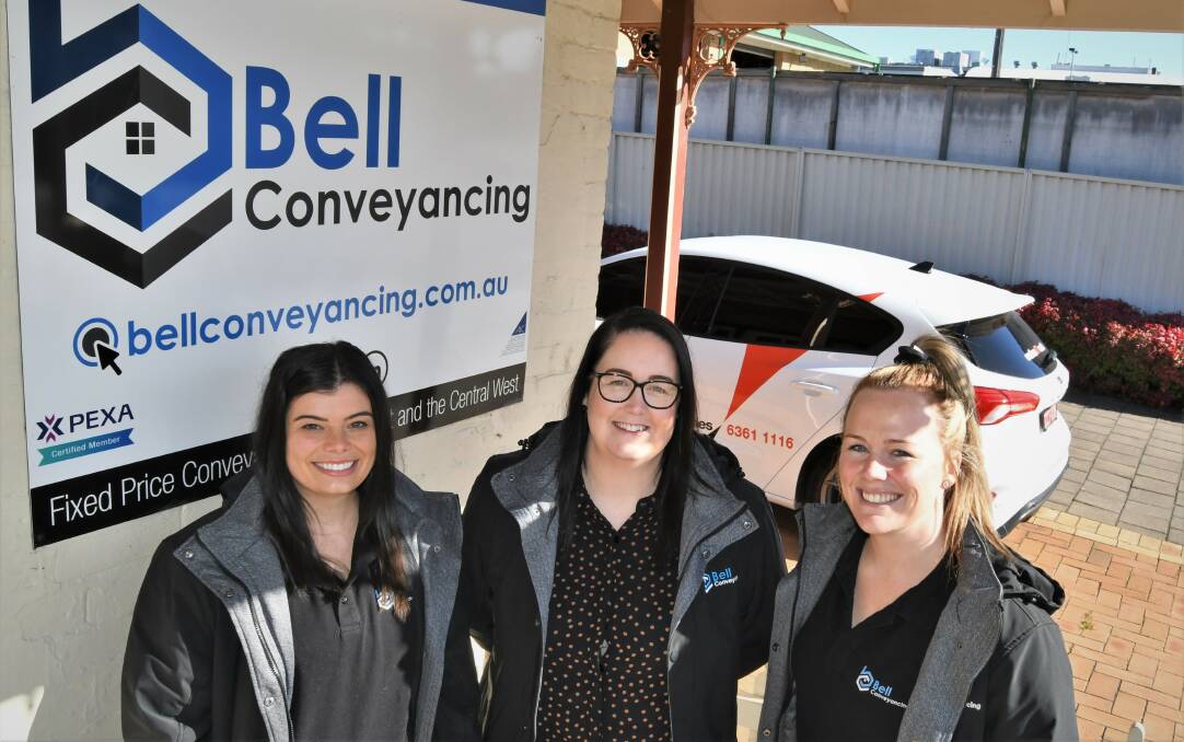 Kristy Bell (middle), pictured with Bell Conveyancing's Amy Vickers and Kate Gullifer, has been named as a finalist in the AusMumpreneur Awards. Photo: CHRIS SEABROOK 