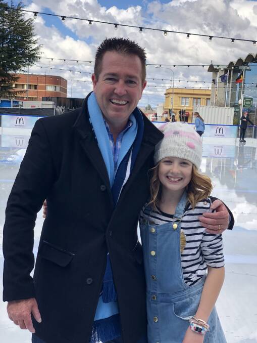 FAMILY: Member for Bathurst Paul Toole with his daughter Scout at the Bathurst Winter Festival.