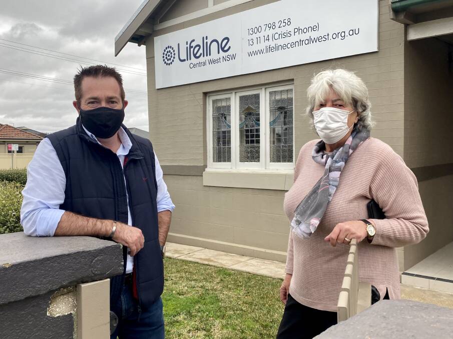 MAKING A DIFFERENCE: Member for Bathurst Paul Toole at Lifeline Central West's Bathurst headquarters with centre supervisor Astrid Taylor.