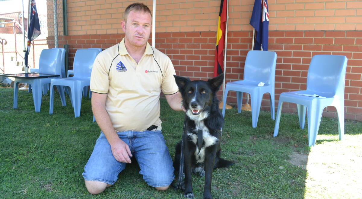 SUNNY DAY: Defence Force veteran Joe Scott and Sunny, a graduate of the Defence Community Dogs program at Bathurst Correctional Centre. 