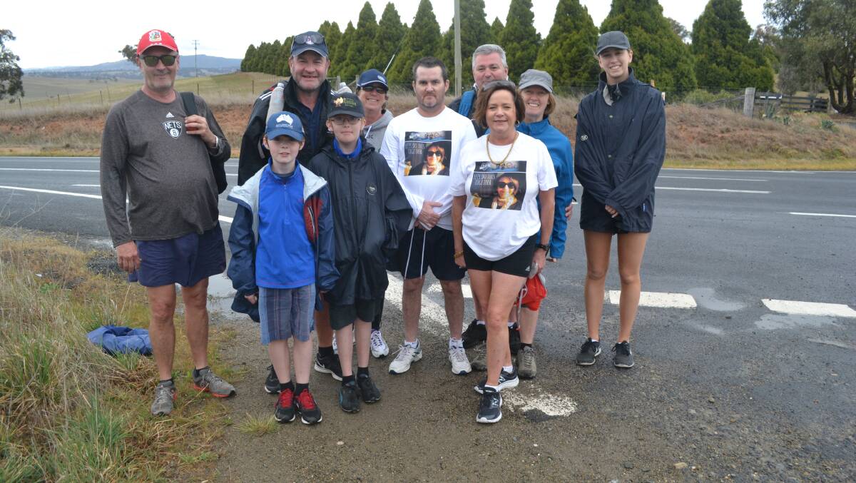 ON THE ROAD: Pat O'Shea (back, second from left) with his walkers last year. 