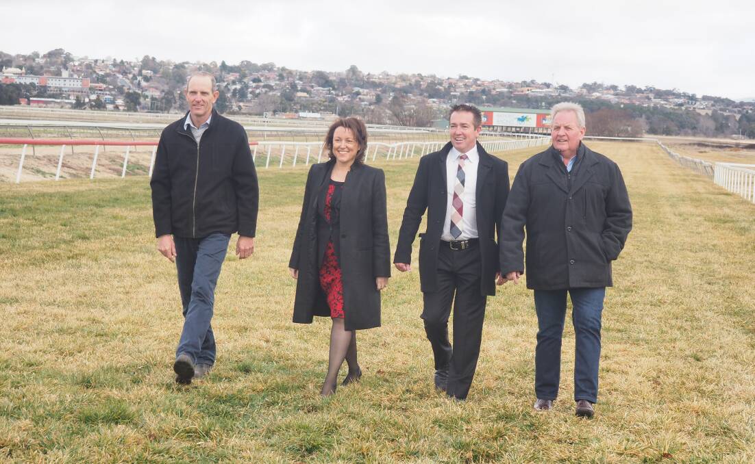 ON TRACK: Bathurst Thoroughbred Racing track manager Simon Morris, Racing NSW board member Saranne Cooke, Racing Minister Paul Toole and Bathurst Liquor Accord president Robert “Stumpy” Taylor. Photo: BRIAN WOOD