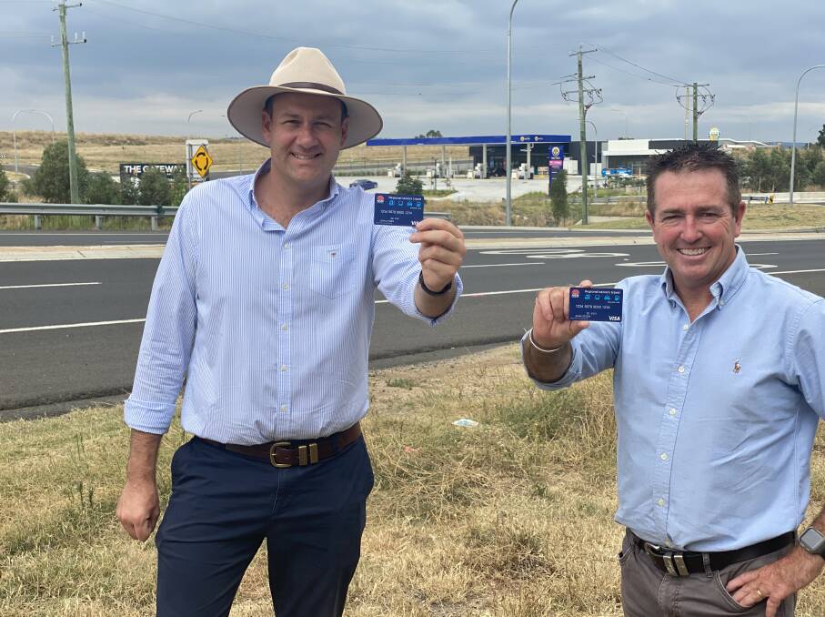 CARD-CARRYING: Minister for Regional Roads and Transport Sam Farraway and Bathurst MP and Deputy Premier Paul Toole with the Regional Seniors Travel Card.