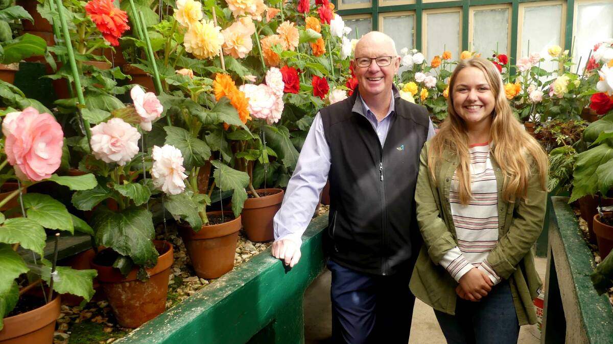 BLOOMING LOVELY: Bathurst mayor Graeme Hanger and Cirencester visitor Alice Chandler in the Begonia House in Machattie Park.