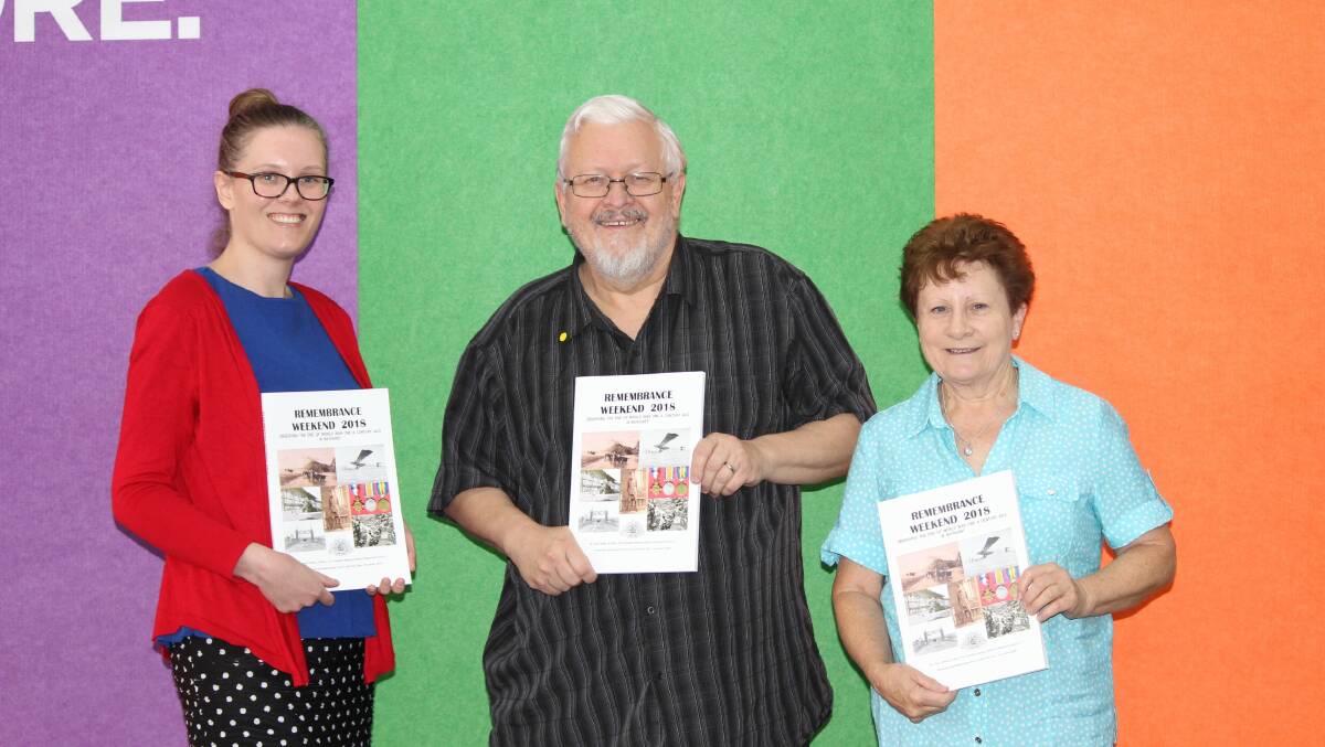 NEXT CHAPTER: Bathurst Library information services team leader Mary-Clare Thatcher, Bathurst District Historical Society vice-president and author Alan McRae and Bathurst District Historical Society president Mary Fletcher with Mr McRae's book. 