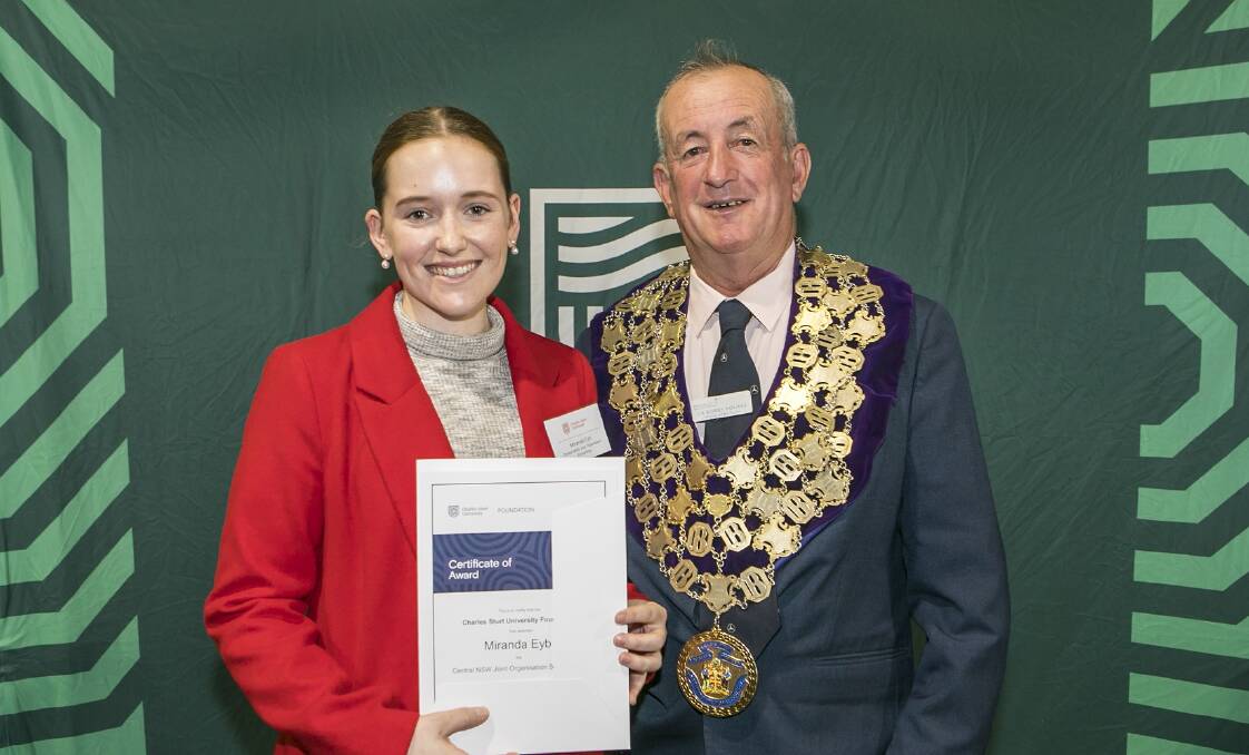 BRIGHT FUTURE: Medical student Miranda Eyb receiving her scholarship from then Bathurst Regional Council mayor Bobby Bourke on behalf of the Central NSW Joint Organisation. Photo: SUPPLIED