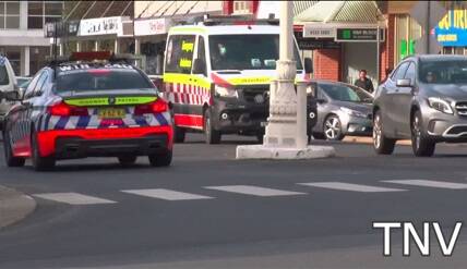 ACCIDENT: Police at the scene of a crash in George Street, where a pedestrian was hit by a car. Photo: TOP NOTCH VIDEO