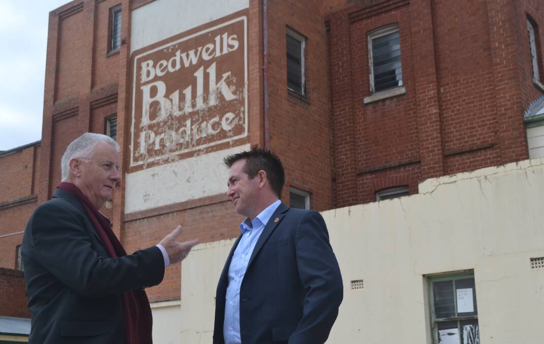 TREMAIN EVENT: Tremain's Mill owner Steve Birrell and Member for Bathurst Paul Toole at the historic site in Keppel Street. 081718tremain3