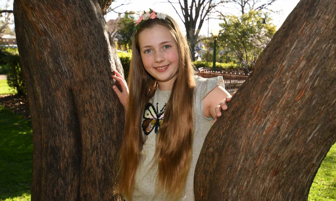 CUT ABOVE: Eden Kauter, 10, will have her long hair cut for charity next month. Photo: CHRIS SEABROOK 091620chairaisng