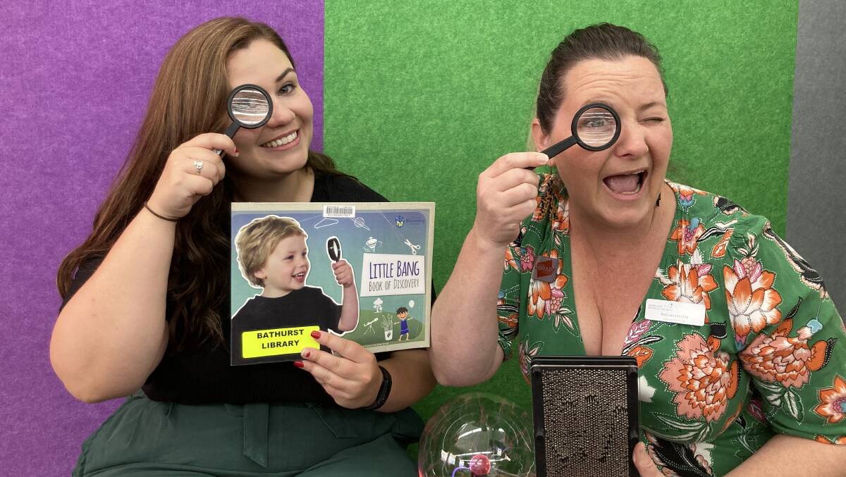 EYE, EYE: Bathurst Library programs team leader Victoria Murray and programs officer Rhiannon Mijovic experiment with some Little Bang Discovery Club activities.