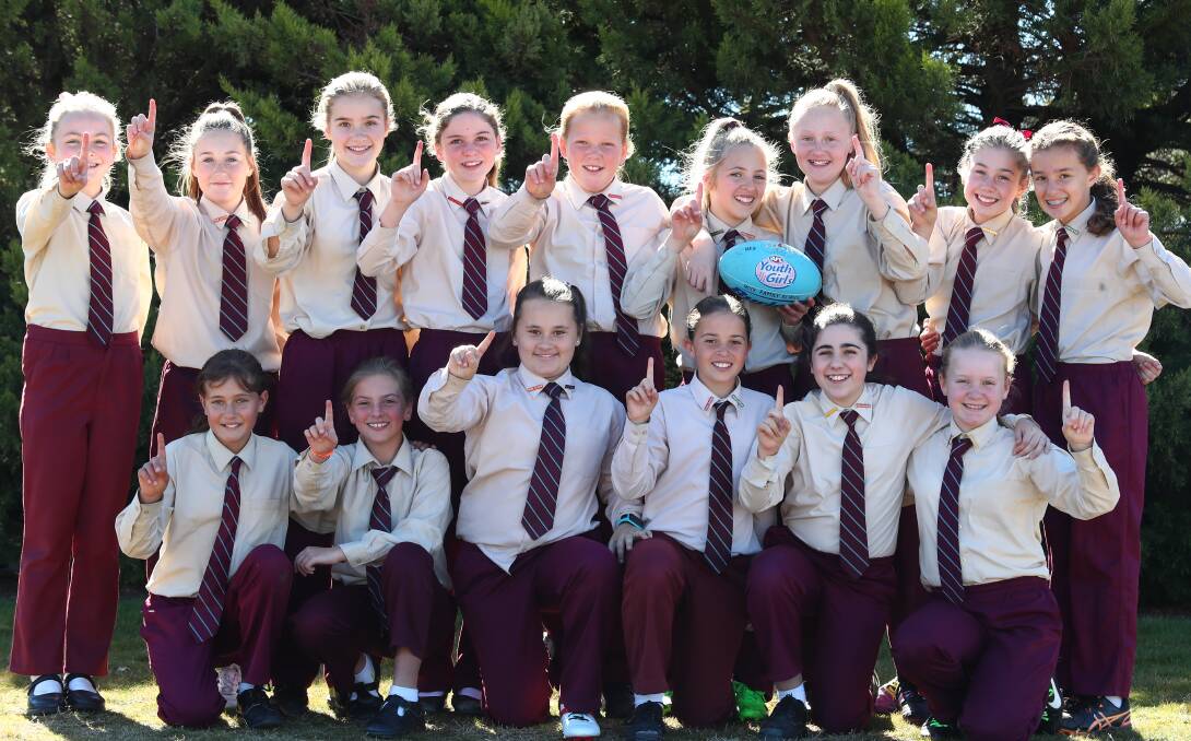 KELLY GANG: The Holy Family girls' Australian rules team to contest the finals of the Paul Kelly Cup. Photo: PHIL BLATCH