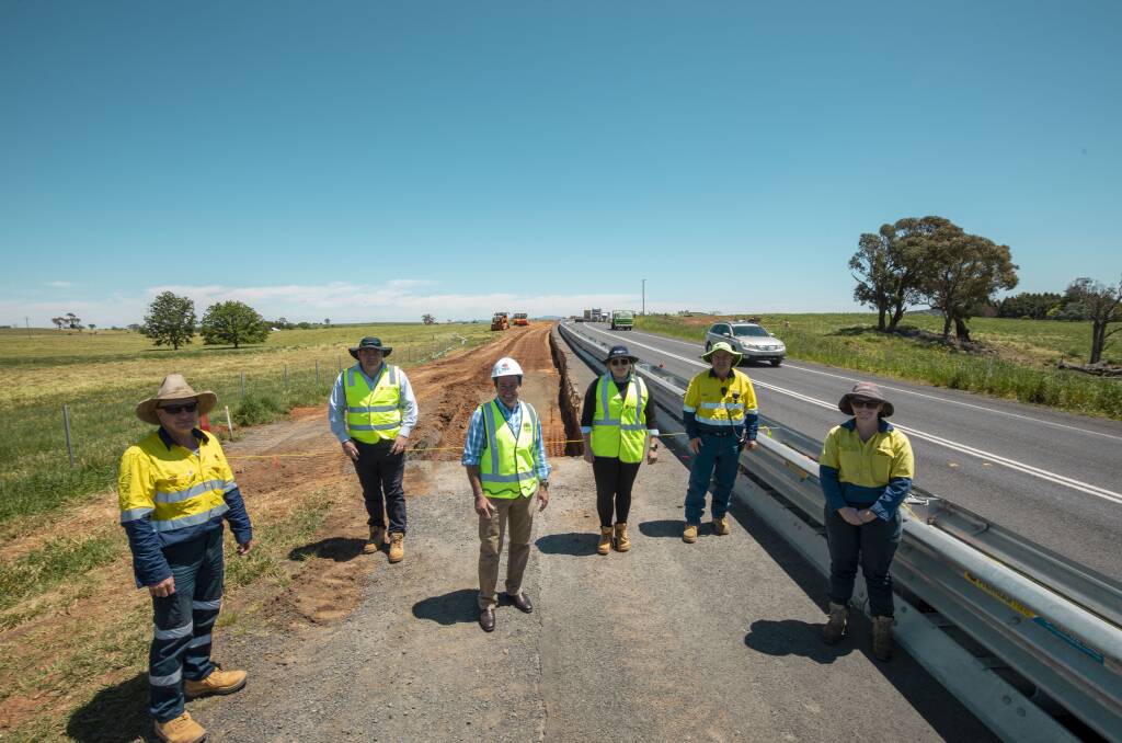 JOBS BOOST: Member for Bathurst Paul Toole, centre, at Guyong on the Mitchell Highway where major safety improvements are being carried out. 