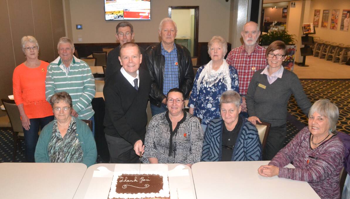 RIGHT NOTE: Bathurst RSL Club general manager Peter Sargent cuts the cake at the thank you morning tea with the Bathurst Country Music Club.