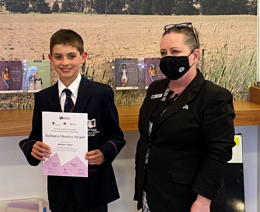 WELL DONE: Scots All Saints College student Matthew Slater and Newcastle Permanent Bathurst branch manager Adele Baldwin. Photo: SUPPLIED