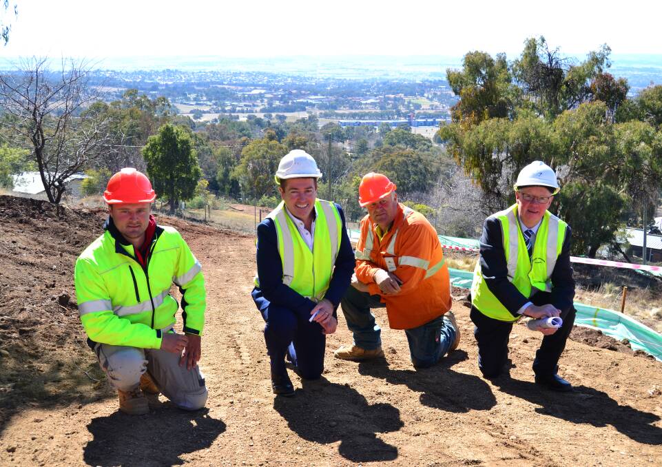 CITY VIEWS: Dylan Webber (left) and Bruce Webber (second from right) from Webber Concrete Construction with Member for Bathurst Paul Toole and mayor Graeme Hanger.