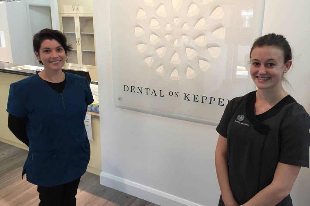 ADJUSTMENTS: Dentist Emma Travis and dental assistant Courtney Hayter at Dental on Keppel, where a number of changes have been made in the time of coronavirus. 